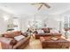 Bright living room showcasing an open layout with a view into the kitchen and dining area at 763 Evans Manor Dr, Weddington, NC 28104