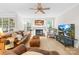 Comfortable living room with hardwood floors, a fireplace, and ample seating at 763 Evans Manor Dr, Weddington, NC 28104