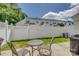 Private backyard area with a patio, seating, and a well-maintained lawn, perfect for outdoor entertaining at 841 Lacebark Dr, Rock Hill, SC 29732