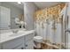 Well-maintained bathroom featuring a vanity, toilet, and shower with a decorative curtain at 841 Lacebark Dr, Rock Hill, SC 29732