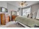 Spacious bedroom with large window, plush carpet, dresser, and ample sunlight at 841 Lacebark Dr, Rock Hill, SC 29732