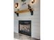 Contemporary fireplace featuring a decorative mantel and shiplap accent wall at 841 Lacebark Dr, Rock Hill, SC 29732