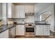 This kitchen boasts stainless appliances, granite countertops, and subway tile backsplash at 841 Lacebark Dr, Rock Hill, SC 29732