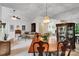 Dining room area flowing into the living area and showcasing mirrored wall at 8506 Graham Rd, Denver, NC 28037