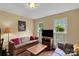 Cozy living room boasts hardwood floors and an abundance of natural light at 8506 Graham Rd, Denver, NC 28037