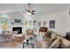Bright living room boasts vaulted ceiling, fireplace, and neutral color palette at 8506 Graham Rd, Denver, NC 28037