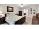 Comfortable main bedroom boasts an ensuite bathroom and ample closet space at 8506 Graham Rd, Denver, NC 28037