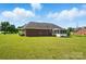 Beautiful brick home with a well-kept lawn, offering plenty of space for outdoor enjoyment at 924 Secrest Hill Dr, Monroe, NC 28110