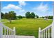 Picturesque view from the front porch overlooking an expansive green yard at 924 Secrest Hill Dr, Monroe, NC 28110