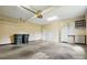 Well-lit garage with storage cabinets, perfect for organizing tools and equipment at 924 Secrest Hill Dr, Monroe, NC 28110