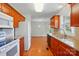 Charming kitchen with light-filled windows, and an easy flow to the dining area at 924 Secrest Hill Dr, Monroe, NC 28110