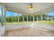 Inviting sunroom with large windows offering stunning backyard views and natural light at 924 Secrest Hill Dr, Monroe, NC 28110