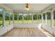 Bright sunroom with beautiful views of the lush green backyard, ideal for relaxation at 924 Secrest Hill Dr, Monroe, NC 28110
