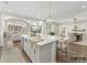 Elegant kitchen with a large central island that flows into the living and dining areas at 1001 Kingbird Ln # 15, Clover, SC 29710