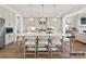 Bright, modern kitchen with a central island, pendant lighting, and stainless steel appliances at 1001 Kingbird Ln # 15, Clover, SC 29710