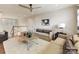 Inviting living room with a comfortable sofa, stylish decor, and an open staircase at 1001 Kingbird Ln # 15, Clover, SC 29710
