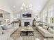 Open-plan living room with high ceilings, a fireplace, large windows, and neutral decor at 1001 Kingbird Ln # 15, Clover, SC 29710