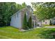 Two-story home has a brick and siding exterior, mature landscaping, and an attached garage at 10044 Markus Dr, Mint Hill, NC 28227