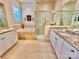 Bright bathroom with granite countertops, a soaking tub, and a glass-enclosed shower, providing a spa-like experience at 1025 N Sharon Amity Rd, Charlotte, NC 28211