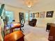 This bedroom features a desk, a large armchair, and basketball memorabilia at 1025 N Sharon Amity Rd, Charlotte, NC 28211