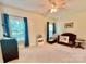 Carpeted bedroom featuring two windows, a crib, and a dresser at 1025 N Sharon Amity Rd, Charlotte, NC 28211