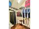 Functional walk-in closet with shelving and hanging space, designed for efficient storage and easy access to belongings at 1025 N Sharon Amity Rd, Charlotte, NC 28211