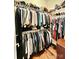 Spacious walk-in closet with ample storage space, perfect for organizing clothes and accessories in an organized manner at 1025 N Sharon Amity Rd, Charlotte, NC 28211