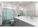 Bathroom with a large countertop, under sink cabinet, and walk-in shower at 1028 Maltby St, Charlotte, NC 28217
