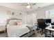 Bright bedroom with neutral decor, large bed, and dedicated desk workspace at 1028 Maltby St, Charlotte, NC 28217