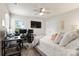 Bright bedroom with neutral decor, large bed, and dedicated desk workspace at 1028 Maltby St, Charlotte, NC 28217