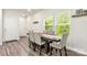 Dining room filled with natural light, connected to the kitchen and living room at 1028 Maltby St, Charlotte, NC 28217