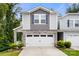 Charming two-story home with stone accents, neutral siding, and a two car garage at 1028 Maltby St, Charlotte, NC 28217