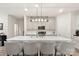 Spacious kitchen with white countertops, pendant lighting, and seating at the kitchen island at 1028 Maltby St, Charlotte, NC 28217