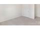 Bedroom with neutral carpet and walls with a white door and trim, ready for personalization to create a cozy retreat at 1039 20Th Avenue Se Loop, Hickory, NC 28602