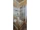 Updated bathroom with glass shower featuring decorative tile at 105 N Central Ave, Belmont, NC 28012