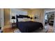 Comfortable bedroom with a well-lit interior and views to the living room beyond at 105 N Central Ave, Belmont, NC 28012