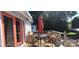 Outdoor deck furnished with a table, umbrella, and chairs for comfortable outdoor entertaining at 105 N Central Ave, Belmont, NC 28012