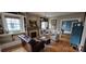 Comfortable living room with hardwood floors, a fireplace, and built-in shelving at 105 N Central Ave, Belmont, NC 28012