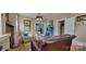 Bright living room featuring hardwood floors, comfortable seating, and charming interior details at 105 N Central Ave, Belmont, NC 28012