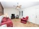 Inviting living area with neutral carpet, a ceiling fan, and ample natural light from the windows at 110 Book Ct, Statesville, NC 28677