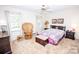 Serene bedroom with a ceiling fan, natural light, and coordinating decor creating a relaxing atmosphere at 110 Book Ct, Statesville, NC 28677