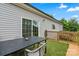 Outdoor deck with ample seating offers a relaxing space for entertaining and enjoying the backyard at 113 Robinette Ln, Statesville, NC 28625