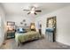 Relaxing bedroom with a ceiling fan, neutral decor, and a calming atmosphere for rest and rejuvenation at 113 Robinette Ln, Statesville, NC 28625