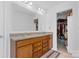 Bathroom with a double vanity, granite countertop and large mirror at 116 Maggie Dr, Mount Holly, NC 28120