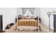 Bedroom featuring a bed with patterned bedding and decorative pillows and wall decor at 116 Maggie Dr, Mount Holly, NC 28120