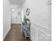 Bright entryway hallway with hardwood floors and stylish decor at 116 Maggie Dr, Mount Holly, NC 28120