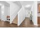Hallway featuring the staircase and a bench at 116 Maggie Dr, Mount Holly, NC 28120