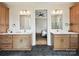 Stylish bathroom with double sinks, marble countertops, modern lighting, and access to both shower and bedroom at 1172 Springlake Rd, York, SC 29745