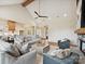 Spacious living area with hardwood flooring, stone fireplace, and an open layout to the kitchen at 1172 Springlake Rd, York, SC 29745