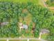 Overhead view of the property showcasing its wooded perimeter and spacious layout at 132 Homeplace Ln, Statesville, NC 28625